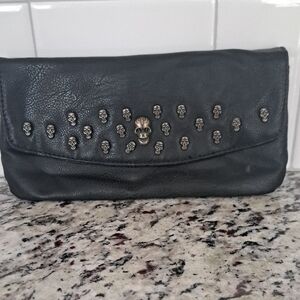 Edgy Black Skull Studded Clutch